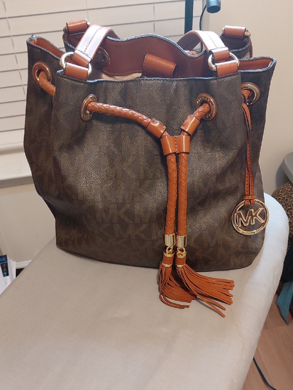 Michael Kors Brown MK Monogram Drawstring Shoulder Bag with Tan Accents